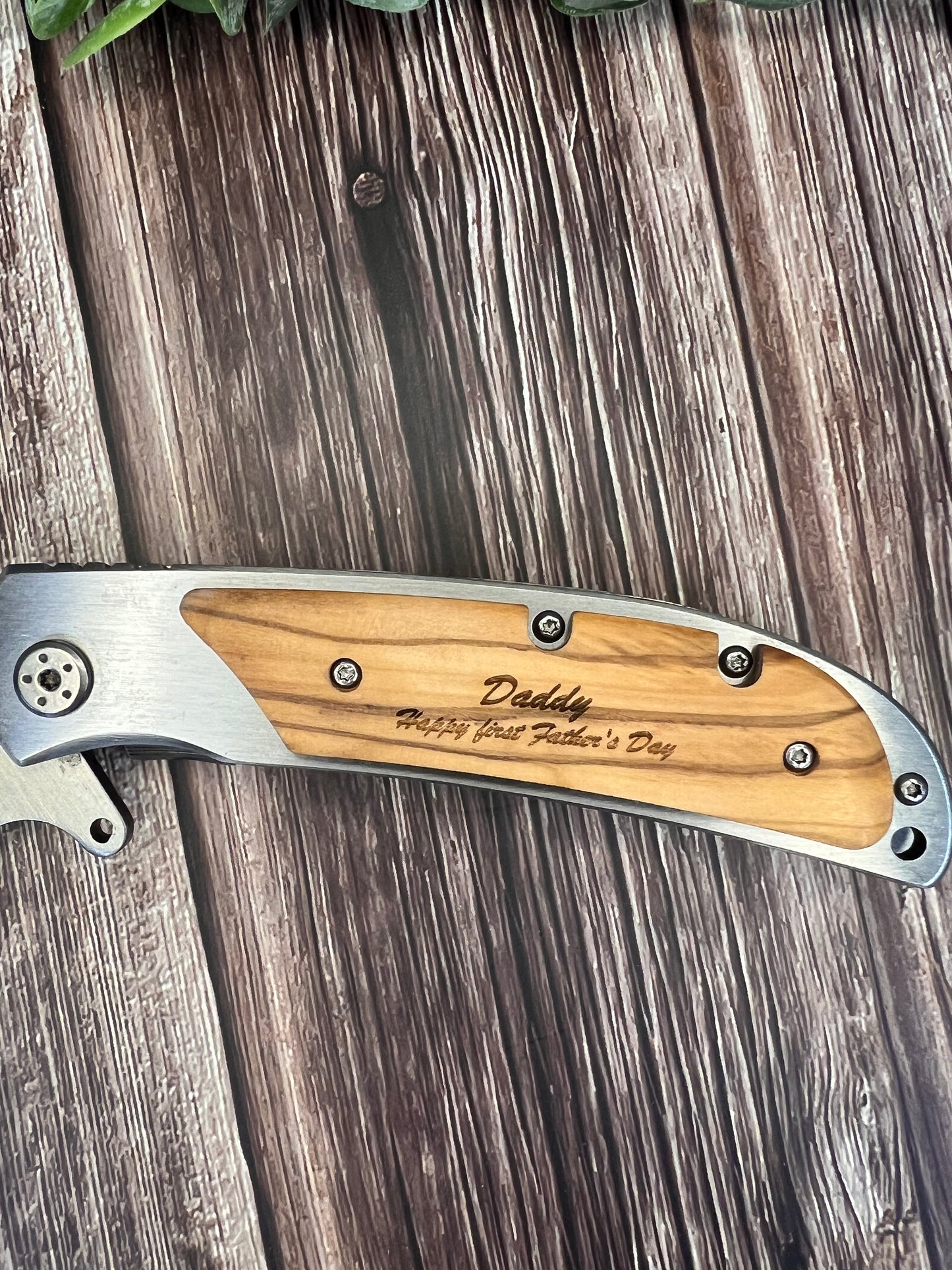 Engraved wooden handle knife