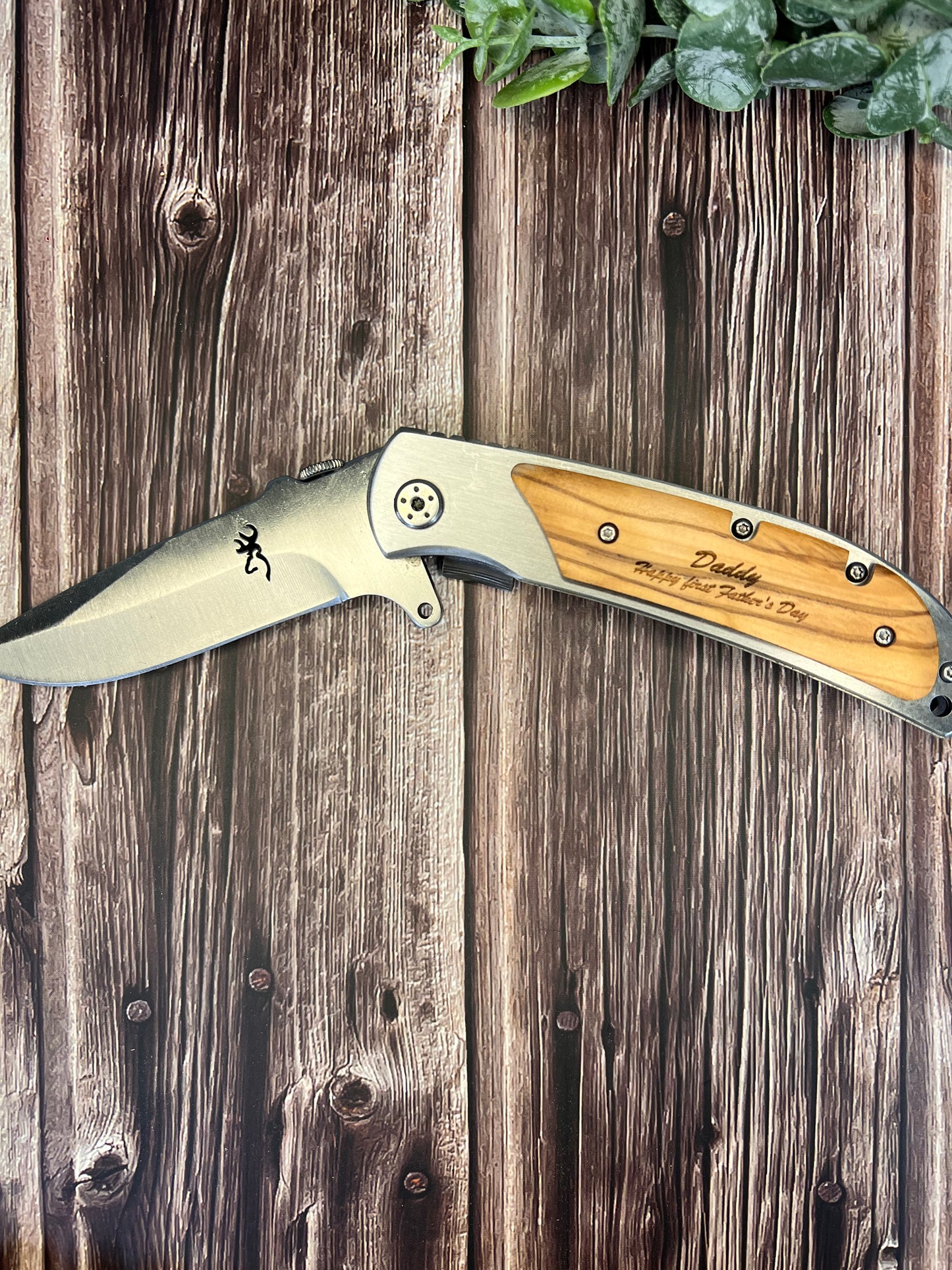 Engraved wooden handle knife